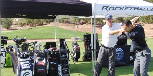 Al Murdock Providing a Student a Fitting and a Lesson